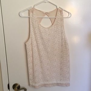 Cream sleeveless blouse with white lace overlay